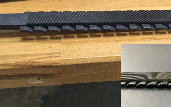 A repaired Leica focus rack